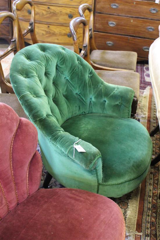 Victorian easy chair with green buttoned upholstery